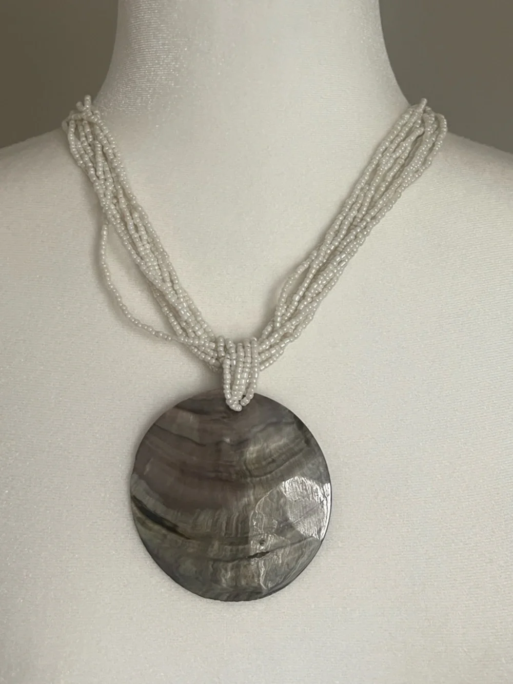White Beaded Necklace with Iridescent Shell Pendant